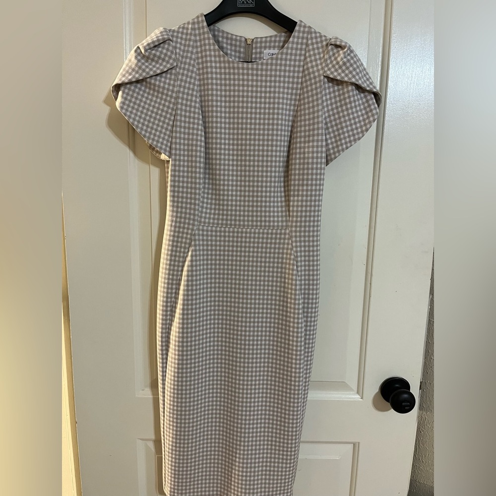 Size 4 scuba sheath by Calvin Klein. Only worn once. EUC.